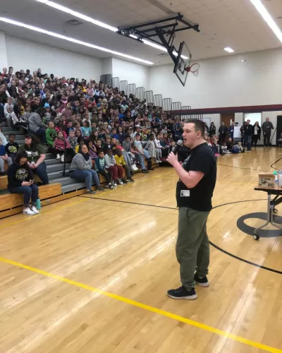 Sam Mitchell Speaking at a school