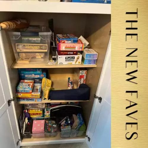 image of cupboard full of board games