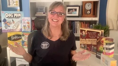 Jen with a selection of her board games